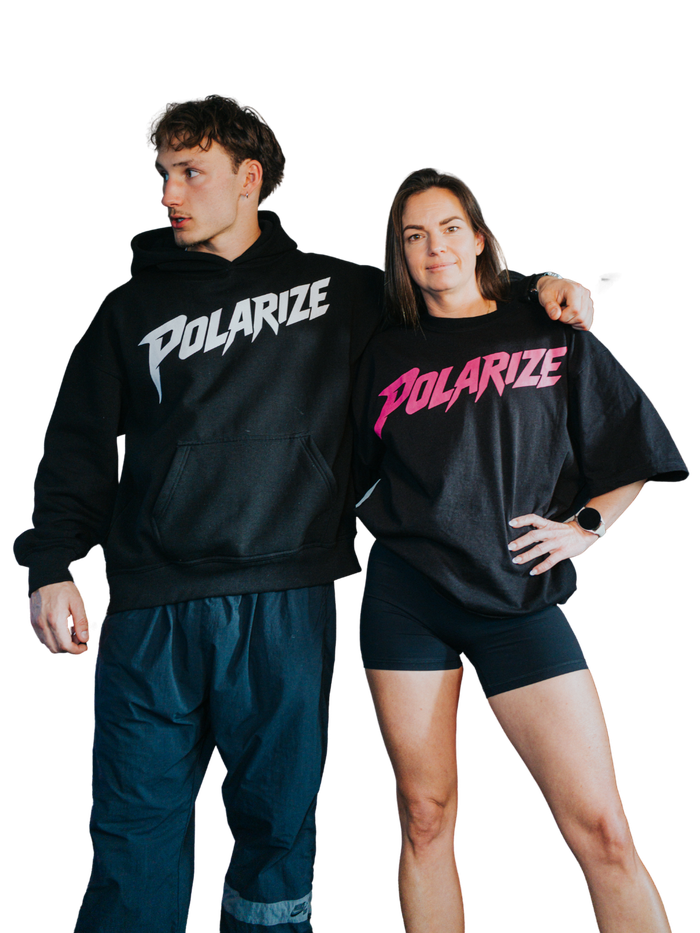 Jackson and Rachel, POLARIZE coaches, wearing Polarize branded gear